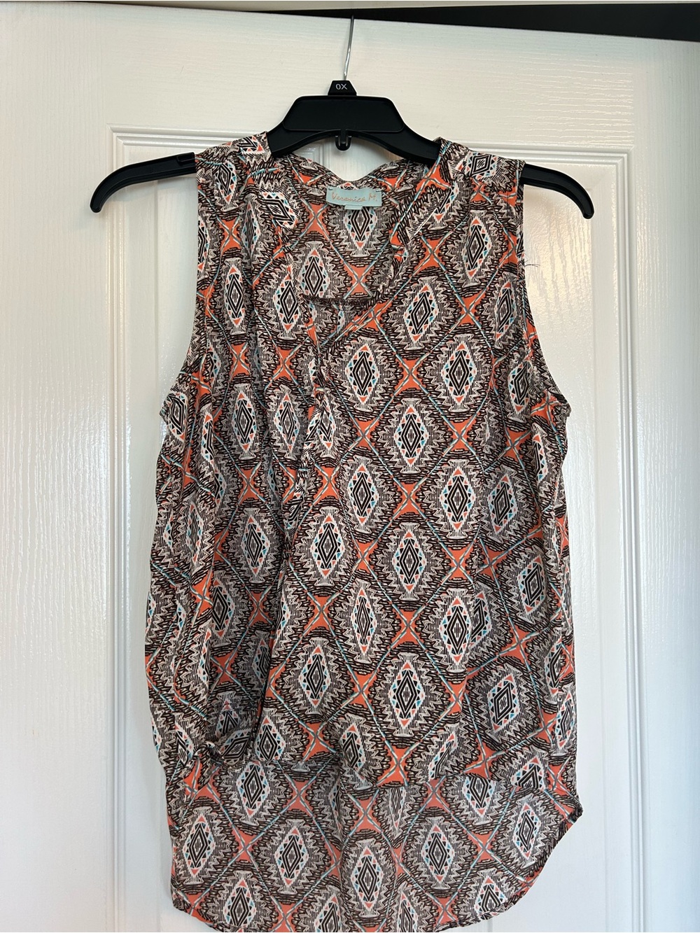 Veronica M sleeveless tiered  Geometric Print Top in Coral and Black